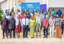 Mr Mina (fourth from right) with participants at the closing ceremony