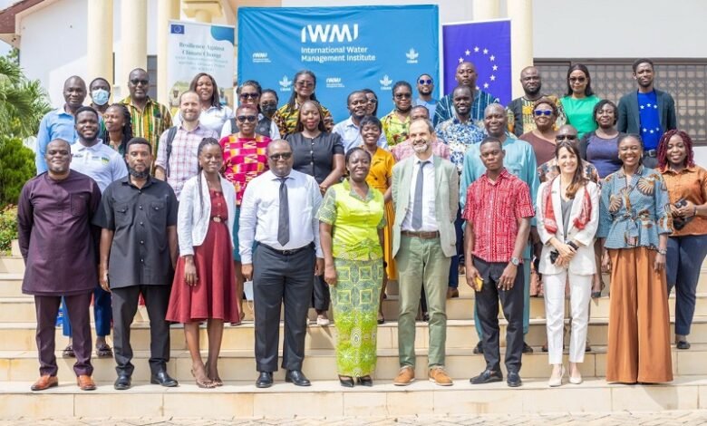 Mr Mina (fourth from right) with participants at the closing ceremony