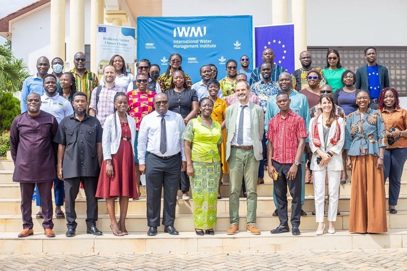 Mr Mina (fourth from right) with participants at the closing ceremony