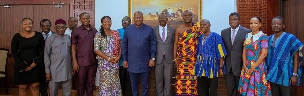 • President Mahama (middle) with the members of the PIAC