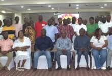 Mr Ebenezer Ahumah Djietror (seated middle) with the parliamentary press corps