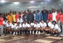 • President Mahama (arrowed) flanked to his right by Vice President Prof. Opoku Agyemang together with dignitaries, officials and players of the team