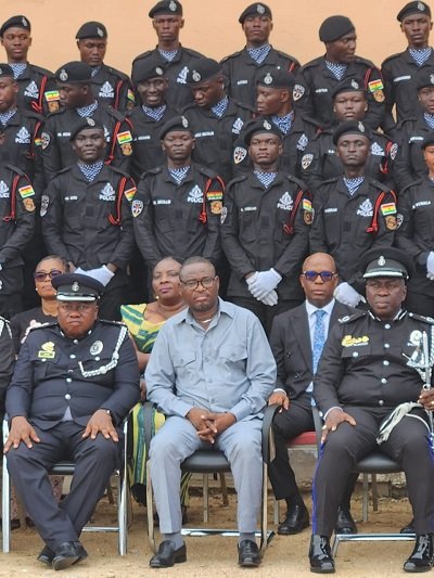 • Mr Roland Atanga Ayoo, MCE for Bolgatanga (in suit) with the senior police officers and the newly recruits
