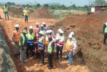 • Mr Agbodza and his team inspecting works on the Ashaiman-Akosombo road project