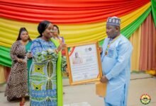 • Mr Atta Issah receiving his award from Ms Mariama Mahama, Principal of Dabokpa Technical Institute
