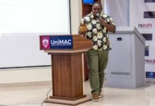 Mr Ebako Mukwele (inset) speaking at the programme