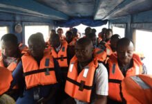 • People wearing live jackets on a rive•r