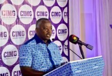 Mr Michael Abbiw (inset) addressing the gathering