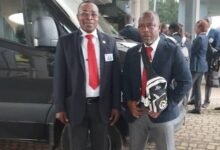 Referee Daniel Gyamfi (left) with colleague Isaac Amponsah in Nigeria