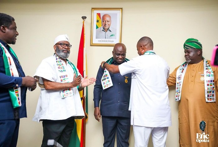 • Mr Eric Opoku being honoured by AU officials