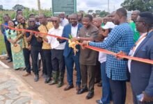 • Dr Asante cutting the tape to commission the park