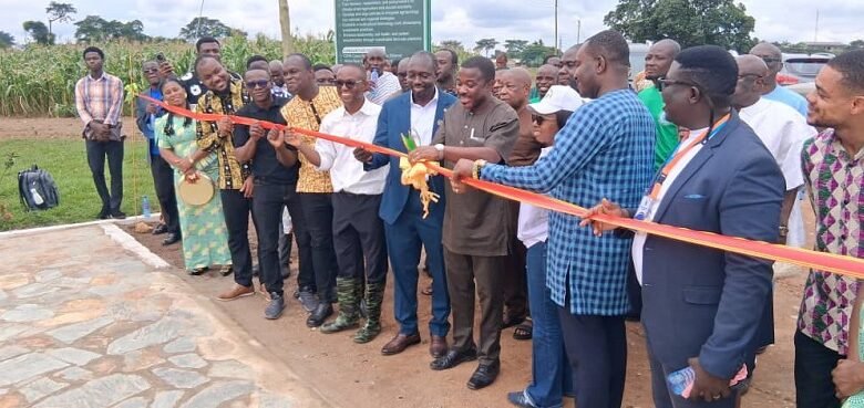 • Dr Asante cutting the tape to commission the park