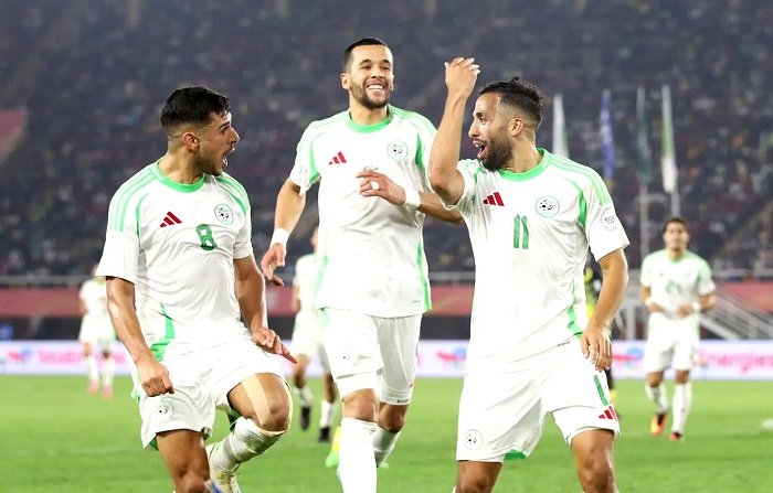 • Algerian players celebrating a goal