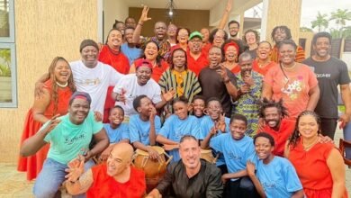Mr Sotou, Deputy Head of Brazilian Mission in Ghana (seated in black) with Ação Zumbi collective