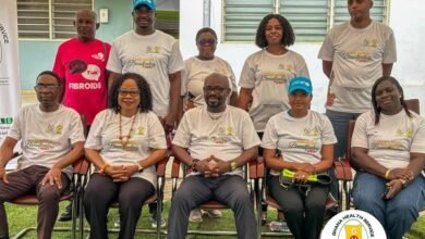 Dr Brightson seated(middle) with some dignitaries at the launch of Breastfeeding Week.