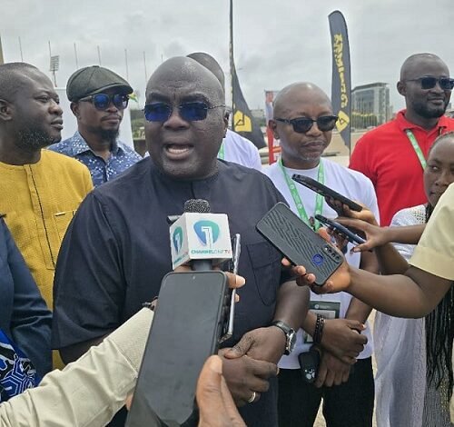 • Mr Debrah speaking at the programme. With him is Mr Mubarak (second from right)