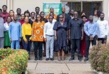 • Mr Ackom (standing sixth from right front row) with some management staff of All Nations University.