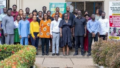 • Mr Ackom (standing sixth from right front row) with some management staff of All Nations University.
