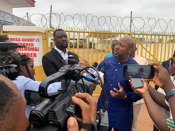 Mr George Spencer Quaye (right) speaking to the media during a tour of the DLVA lands