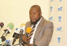 • Dr Said Boakye (inset) making a presentation at the programme Photo: Ebo Gorman