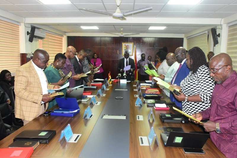• Mr Emmanuel Armah-Kofi Buah (middle) swearing in the new Board of the EPA Photo: Seth Osabukle