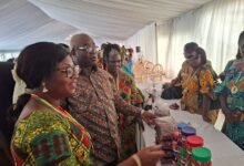 Mr Eric Opoku touring food exhibition at the event