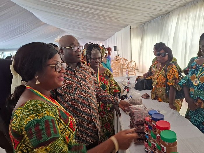 Mr Eric Opoku touring food exhibition at the event