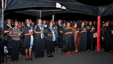 Staff and mourners at the vigil