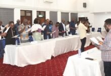 • Dr Sitsofe David Addo (in smock), Board Chair, Engineering Council, inaugurating the technical committee members Photo: Ebo Gorman