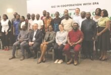 • Mrs Biritwum (third from left) and Mr Wegner (fourth from left) with participants after the launch