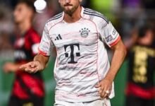 Harry Kane celebrates after scoring