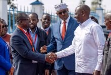 Kenya President Ruto (right) shakes hands with Dr. Siaw Agyepong, Executive Chairman, JGC