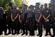 • COP Christian Tetteh Yohunu (fourth from left) with the widow, Priscilla Ofori-Atta (fourth from right) and other family and POMAB members after the visit