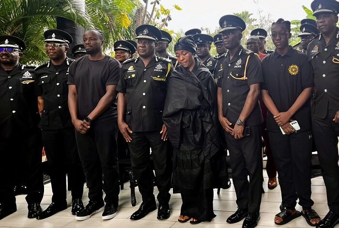 • COP Christian Tetteh Yohunu (fourth from left) with the widow, Priscilla Ofori-Atta (fourth from right) and other family and POMAB members after the visit