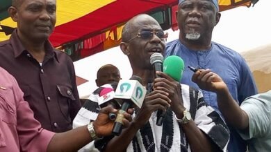 • Mr Asiedu Nketia (Inset) addressing the public at the funeral grounds
