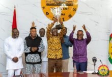 • Mr Bagbin lifts high the trophy after receiving it