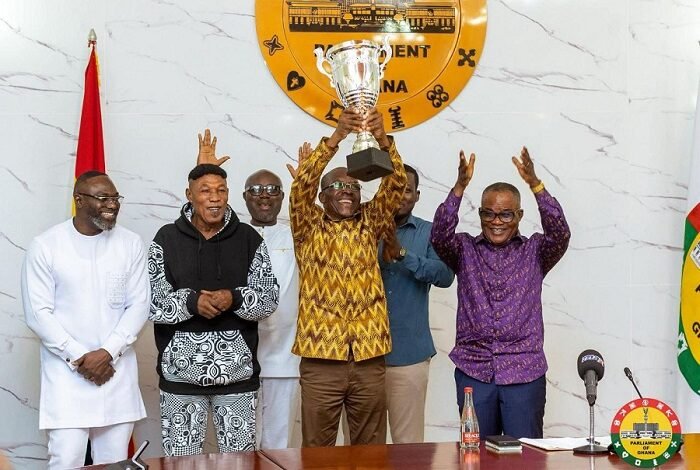 • Mr Bagbin lifts high the trophy after receiving it