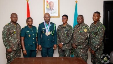 • Mr Basintale Amadu (third left) flanked to his right by Head of Sports at GIS, Superintendent Anita Wiredu-Minta and the pullers