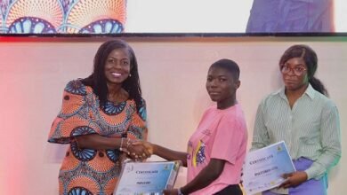• Ms Wiafe (left) presenting a certificate to one of the finalists of the Girls in ICT in the Greater Accra region