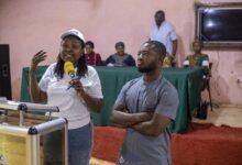 • Mrs Nyarko (inset) addressing the gathering