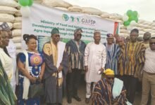 • Mr Eric Opoku (middle) with other dignitaries after the launch