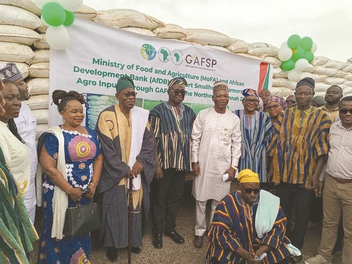 • Mr Eric Opoku (middle) with other dignitaries after the launch