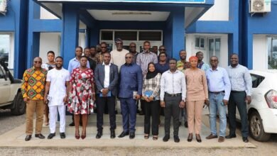 • Mr Shafic Sulemana (fourth from left) with Eastern Regional Manager of PURC, Ms Kesewaa Apenteng-Addo and Management of GWL