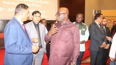 • Mr Eric Opoku (middle) interacting with Pakistan officials at the rice show programme. Photo. Ebo Gorman