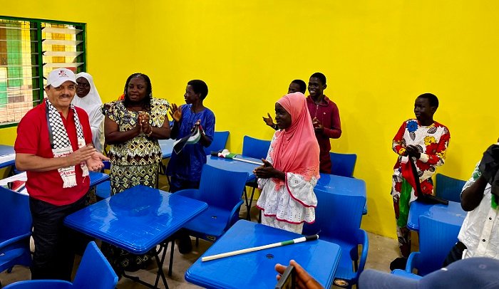 • Mr Abdalfatah Ahmed Khalil Alsatarri (left) with Victoria Amefadzi Yawa Doe inspecting the classrooms