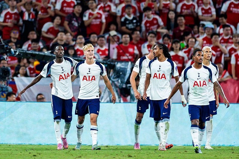 Pape Matar Sarr (left) joined by teammates after his goal