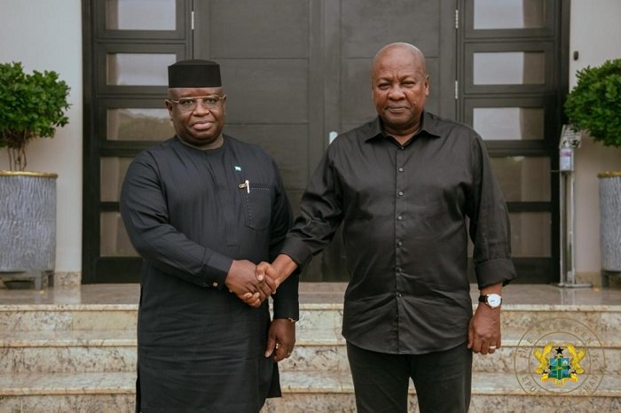 • President John Mahama (right) being consoled by President Julius Maada Bio
