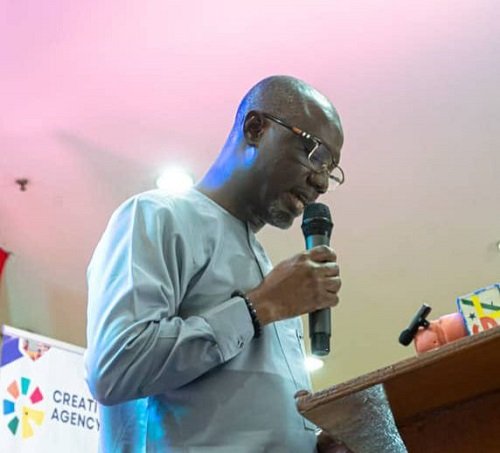 Mr Ziblim (inset) addressing the gathering