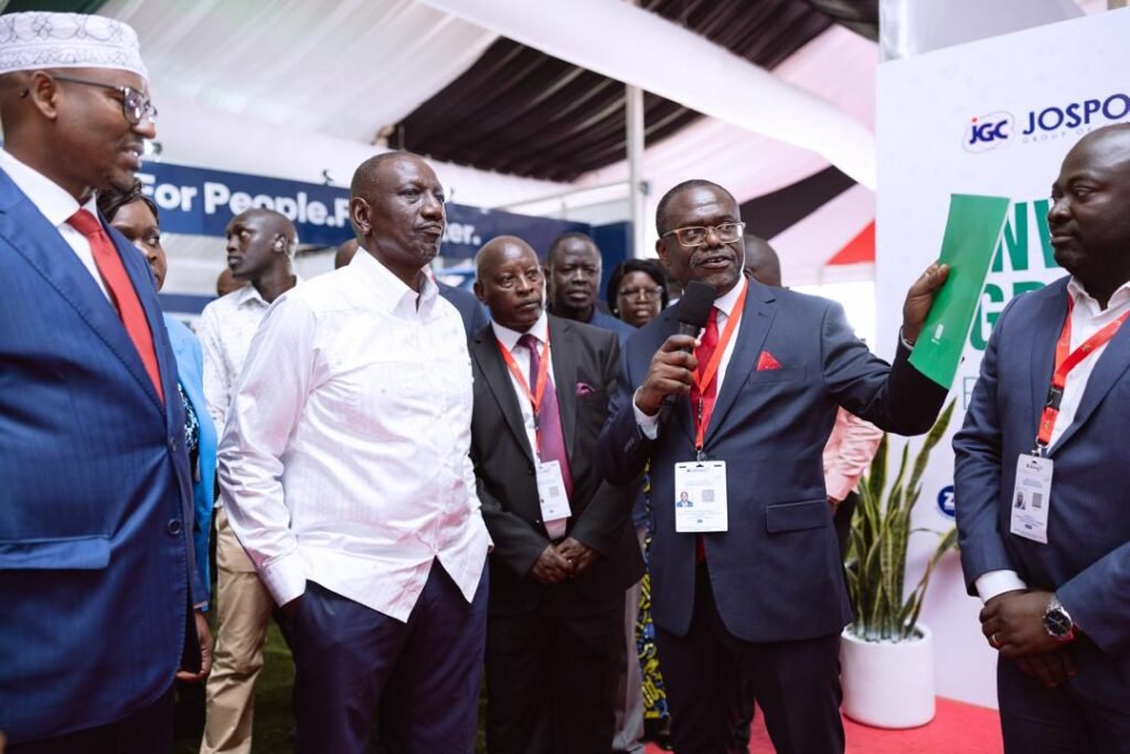 • Dr. Siaw Agyepong (with mic) explaining the operations of his waste management companies to H.E. Dr. William Samoei Ruto (in white shirt),after the Kenyan President visited the stand of Jospong Group at the exhibition booth