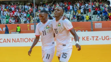 Ryan Ogam (15) with a team mate after his goal